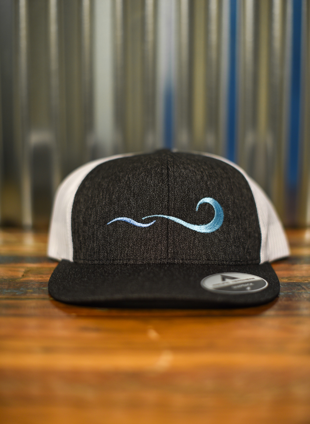 Trucker Hat – embroidered front and back. Front view
